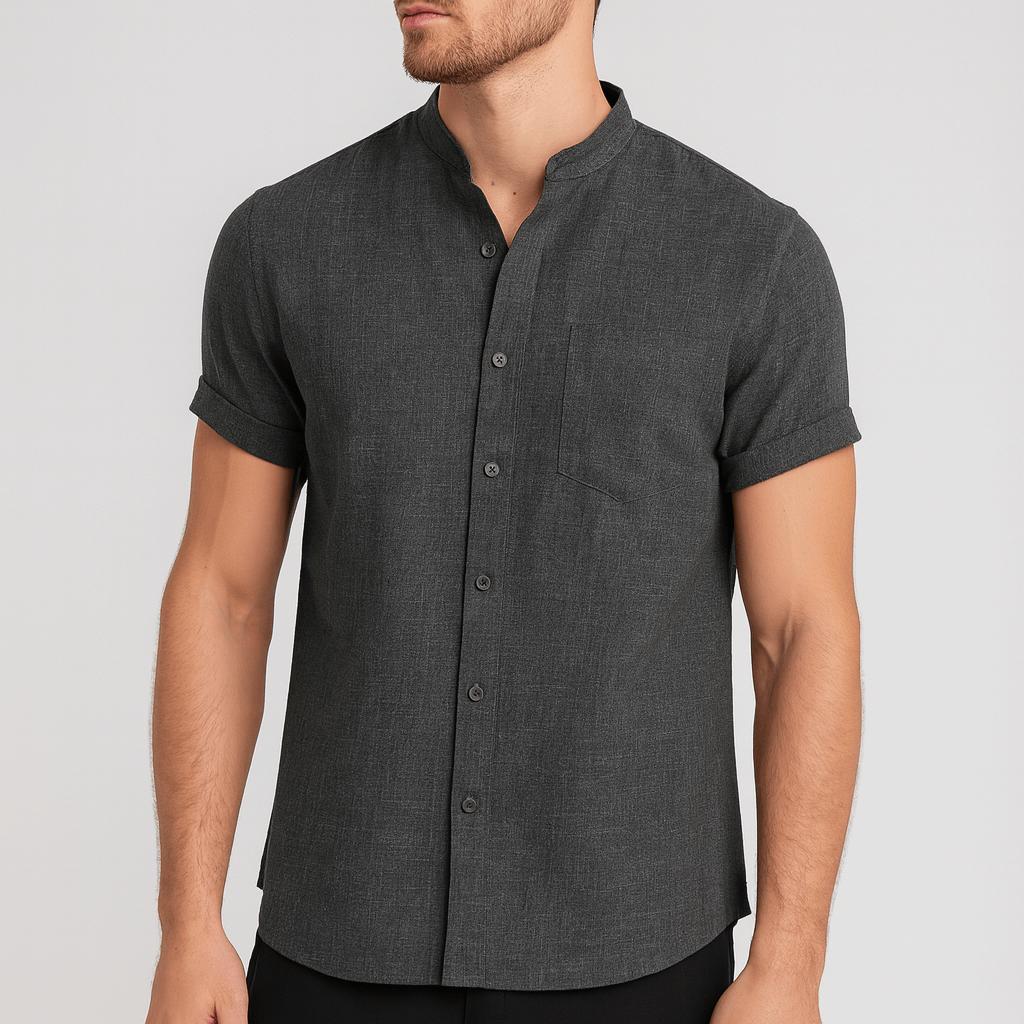 Koszulka polo z kołnierzykiem typu stójka, podwiniętymi mankietami i kieszenią