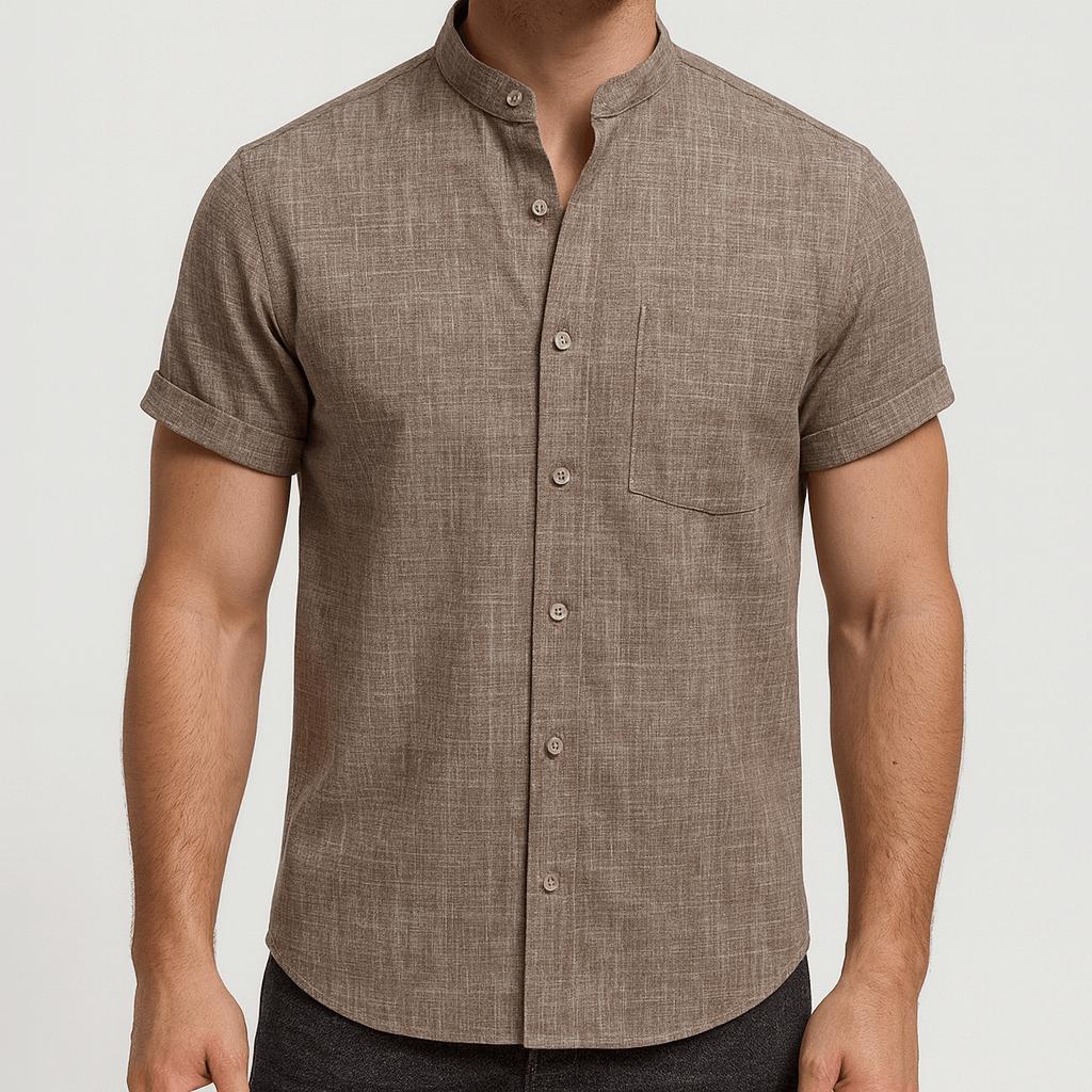 Koszulka polo z kołnierzykiem typu stójka, podwiniętymi mankietami i kieszenią