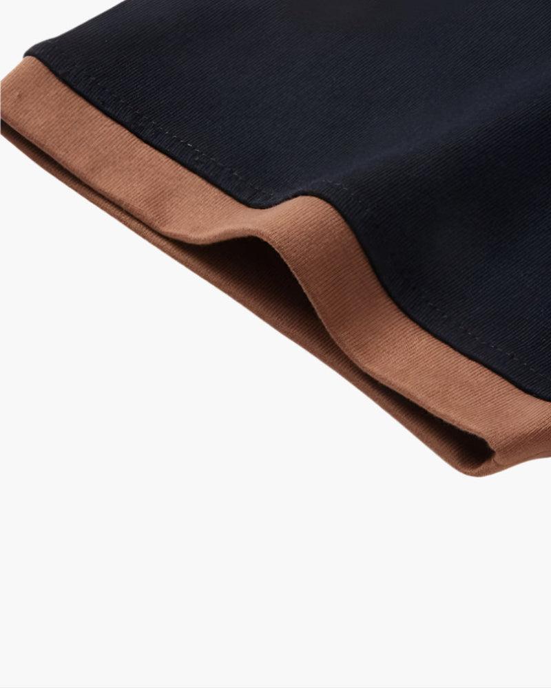 Koszulka polo z kontrastowym kołnierzykiem, luźnym krojem i eleganckim wykończeniem