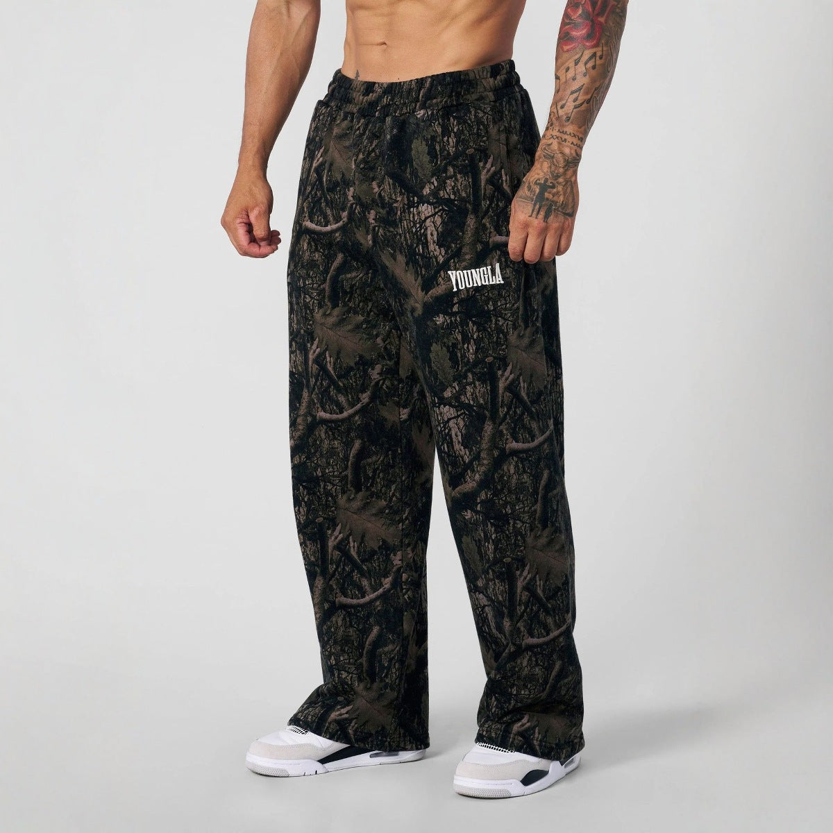 Spodnie dresowe męskie moro, szerokie, z gumką w pasie, na trening i na co dzień - Czarny