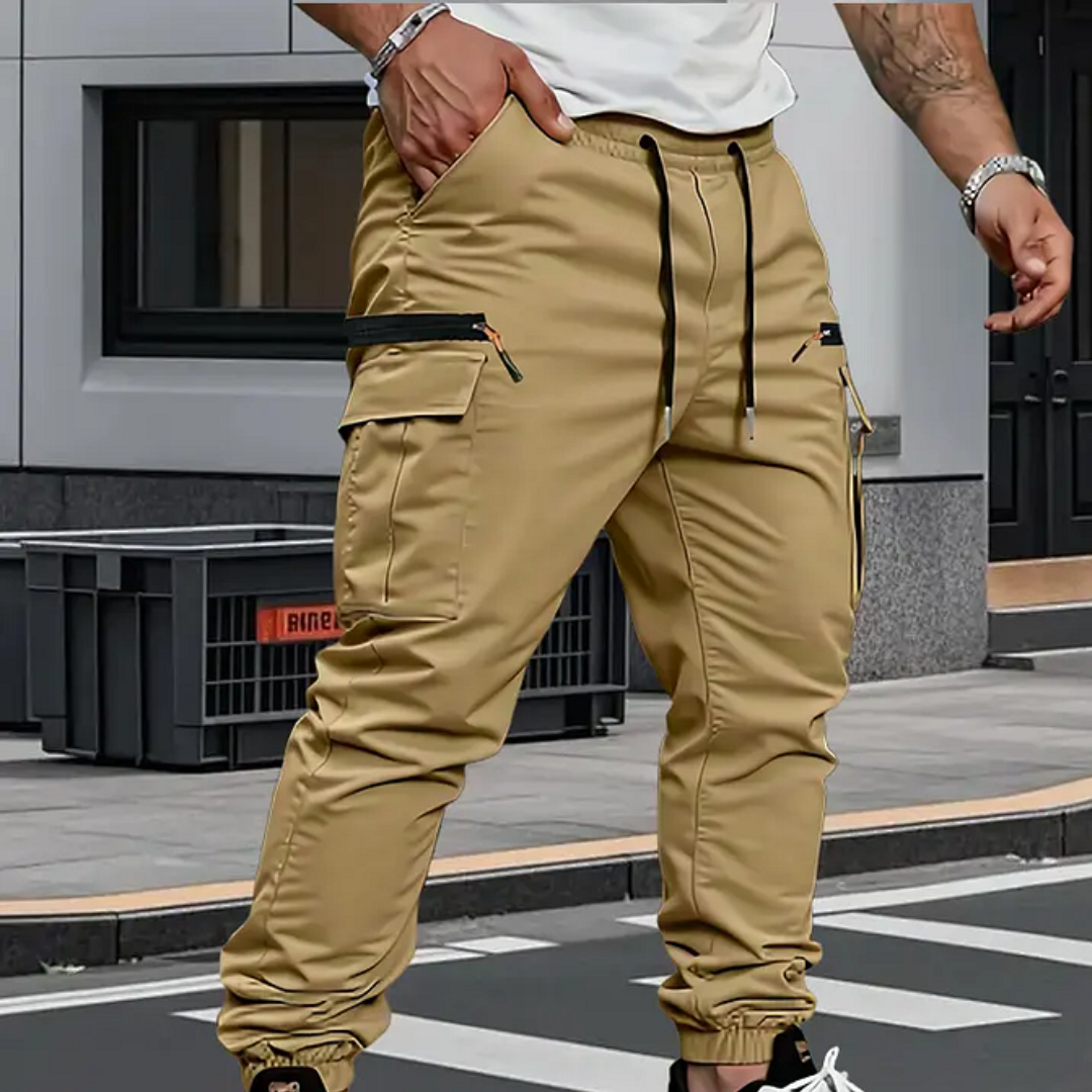 Spodnie joggery męskie cargo z kieszeniami na zamek, zwężane nogawki ze ściągaczami, na co dzień - Khaki